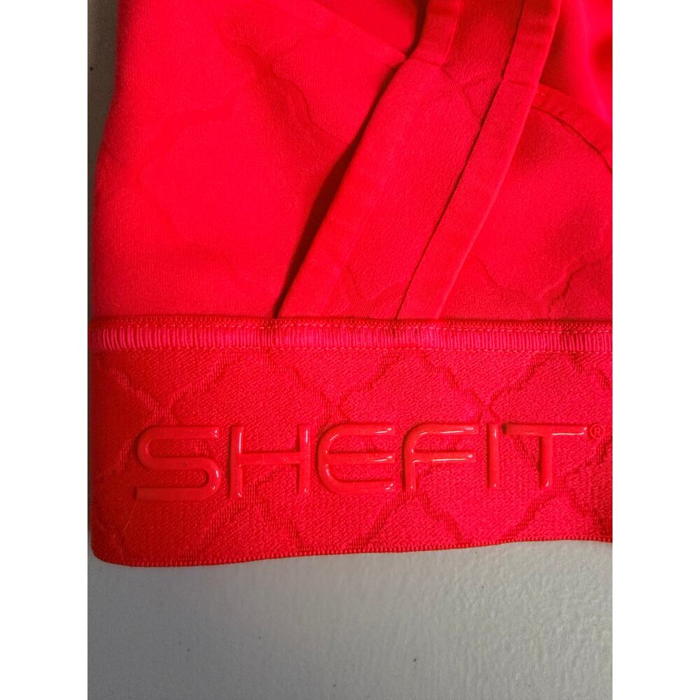 SHEFIT Bright Coral Sports Bra 2Luxe Zip Front Adjustable Straps Cross NWOTBack - Picture 8 of 9